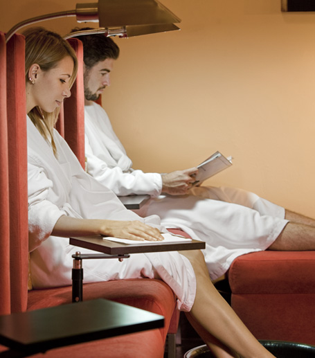A woman and a man relaxing in a spa