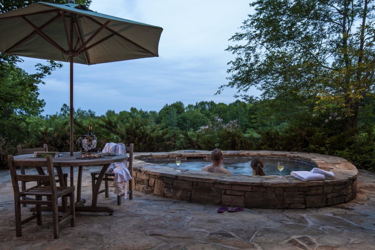 couple in an outdoor spa