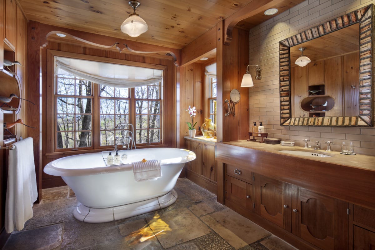 bathroom with white tub