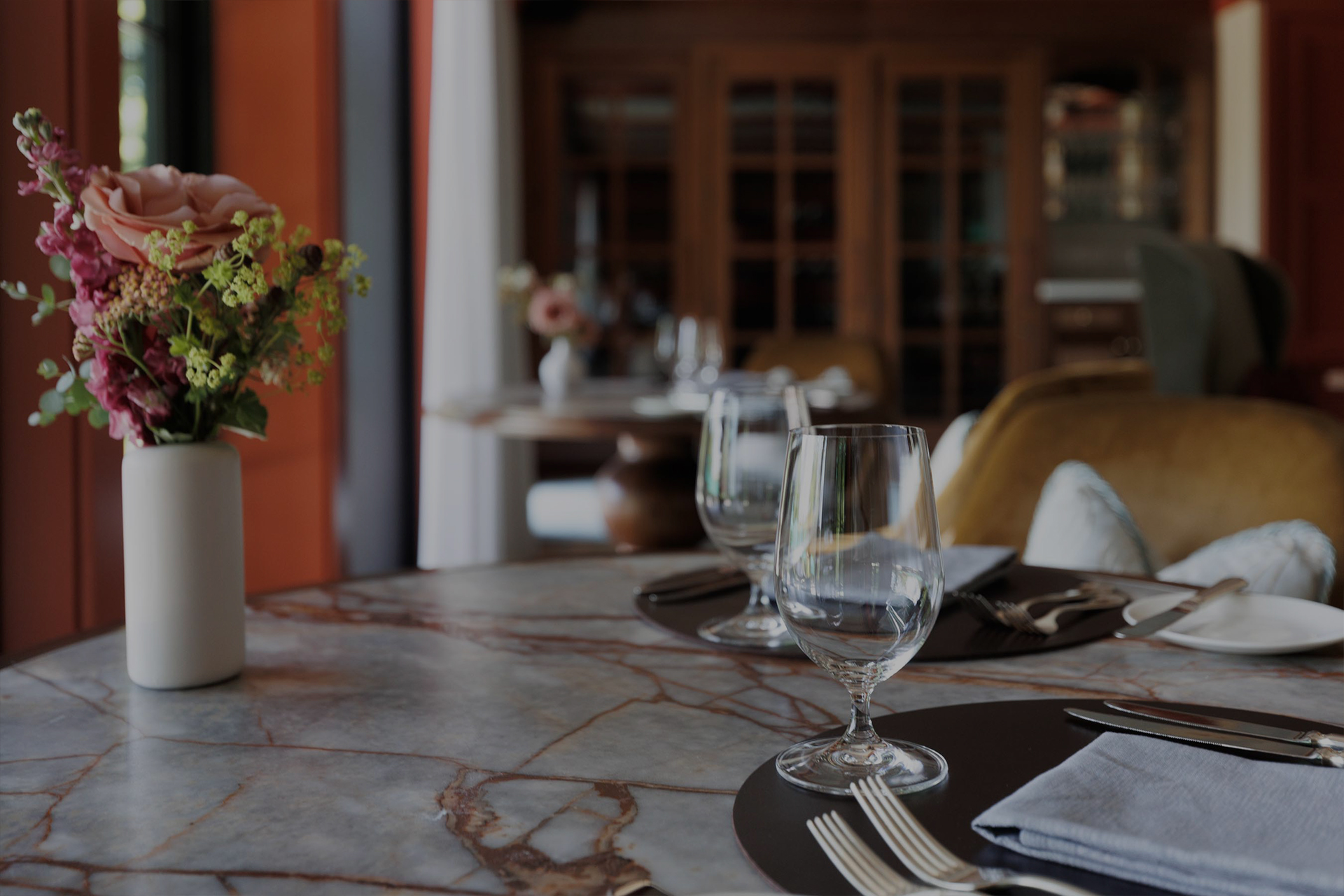 dining table with vase of flowers